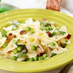 farfalle piselli pomodori secchi