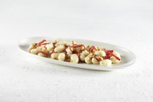 Gnocchi di patate, Bresaola della Valtellina Igp, crema di Gorgonzola Dop e noci