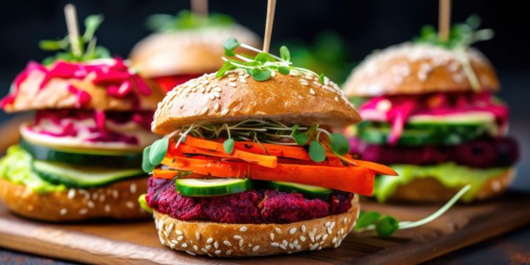 vassoio di legno con 4 burger vegetali