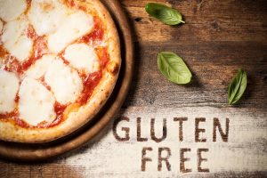 Pizza senza glutine: ricetta base gluten free e come condirla