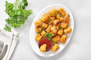 Nuggets di pollo al forno: panatura dorata e super croccante