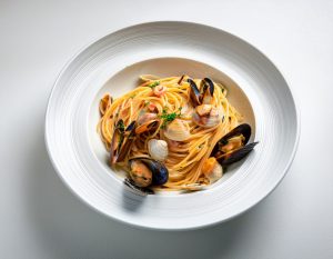 Spaghetti allo scoglio: primo piatto di mare con ingredienti e varianti